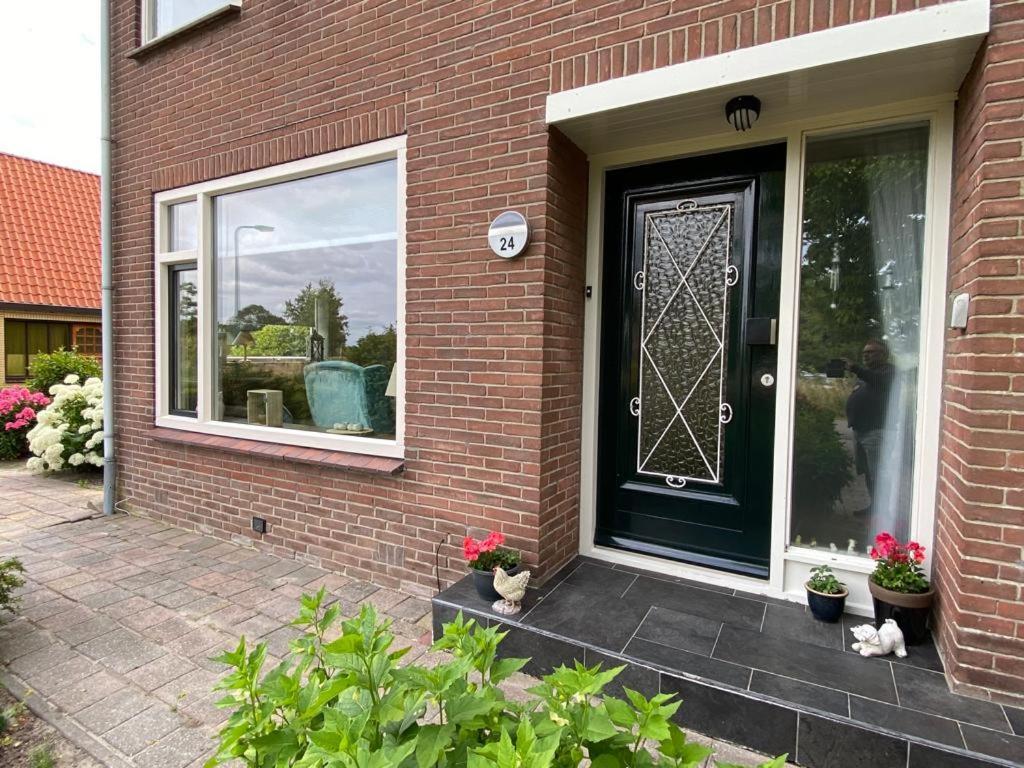 Huis Bij Het Water Met Sloepje Jutrijp Exterior foto